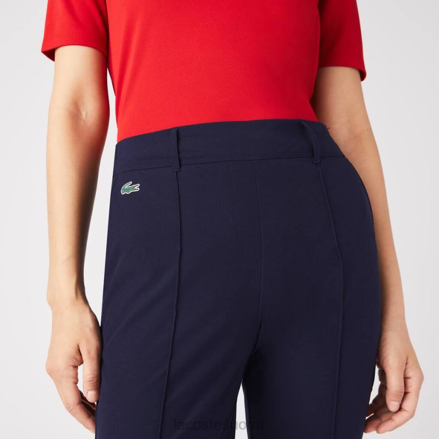 vaatetus Lacoste urheilulliset stretch-golfhousut laivastonsininen naiset VR262658